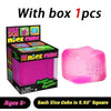 Pink Nice Cube stress toy with embossed face.