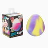 NeeDoh Dippin' Eggs purple-yellow color-changing squishy egg shown with box
