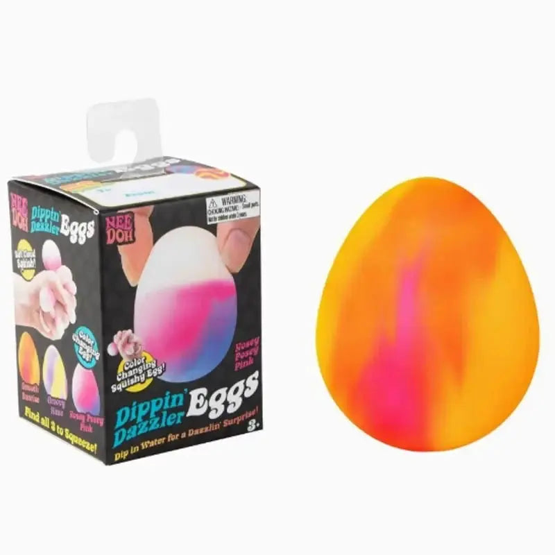Orange and pink streaked color-changing egg toy with NeeDoh box