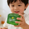 Sprite Nee Doh Nice Cube green squishy cube held by a child