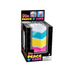 DOH Peace o' Cake boxed toy with blue, yellow, and pink layers in window